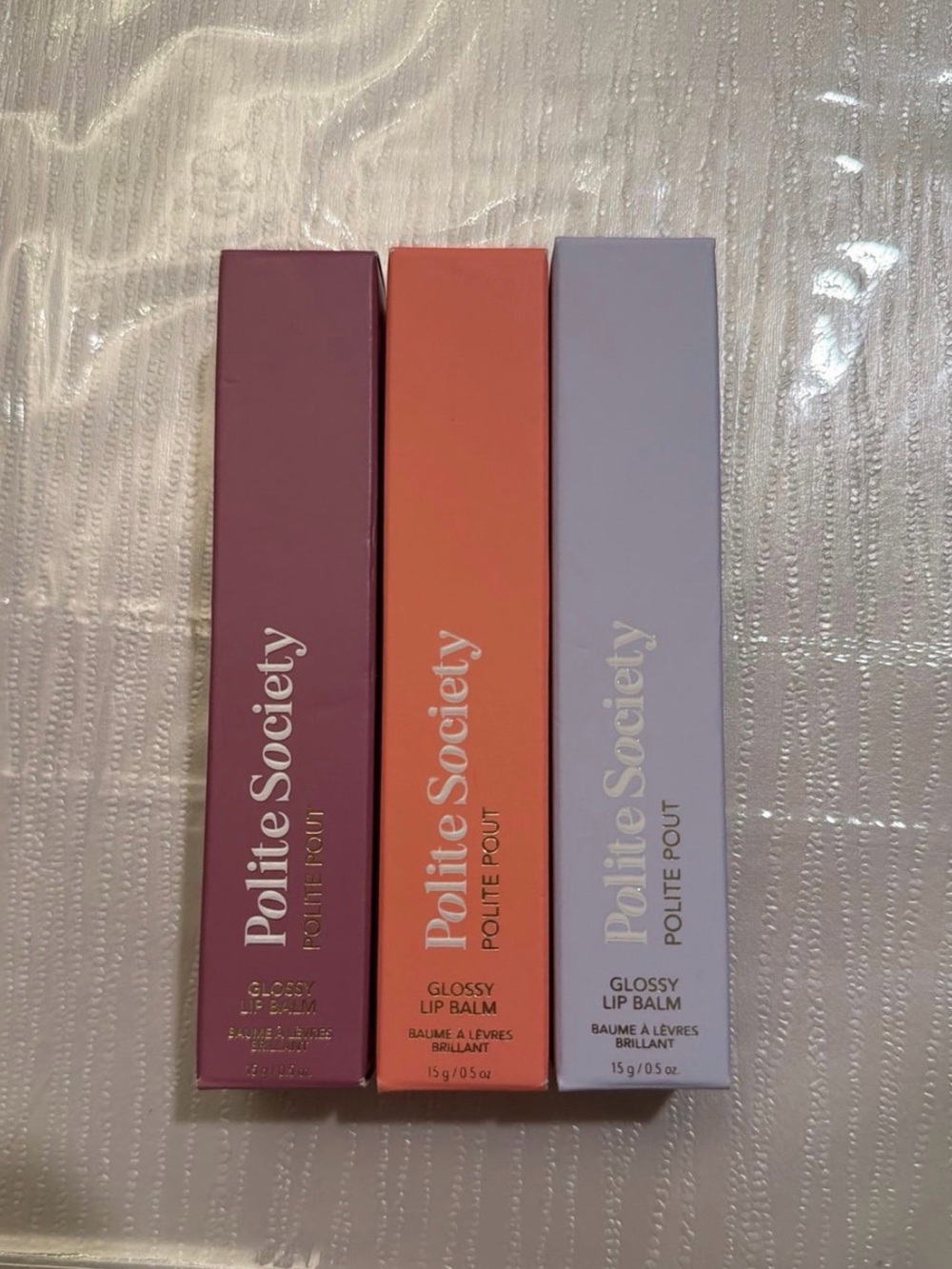 Polite Society Glossy Lip Balm Trio — Plum, Coral, Lilac